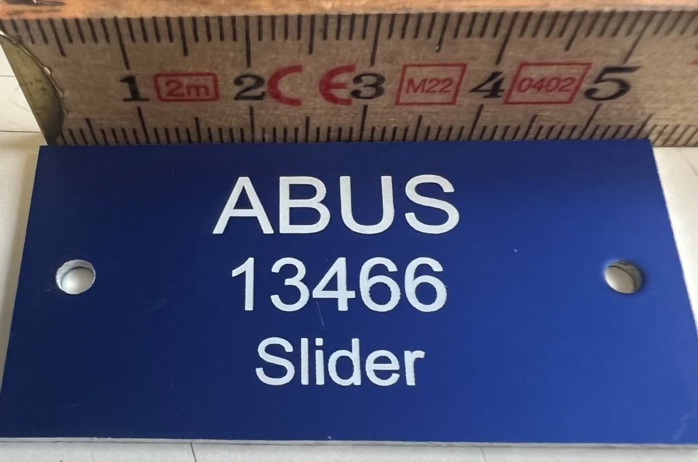 ABUS: Gravur auf Eloxal